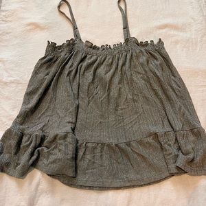 Beautiful Anthropologie crop tank top, ruffle bottom. Shiny.